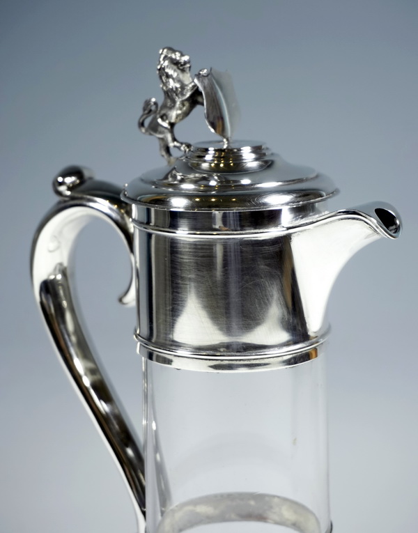 Silver glass carafe with silver mount with coat of arms and lion carafe with silver mount lion figure Horace Woodward & Co Ltd London England 1906-07