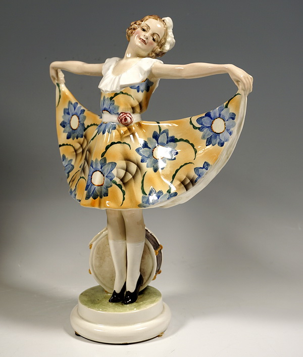 GOLDSCHEIDER lady dancer in flower dress with drum dancer with drum Lorenzl c 1925