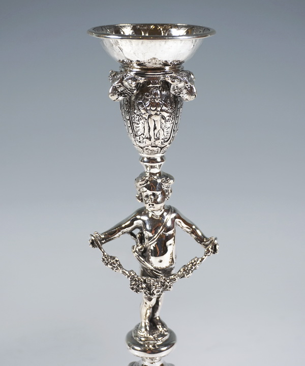 Pair of silver candlesticks with putto and rams heads pair of silver candlesticks with cupid and rams heads Eduard Gottsleben Vienna ca 1890